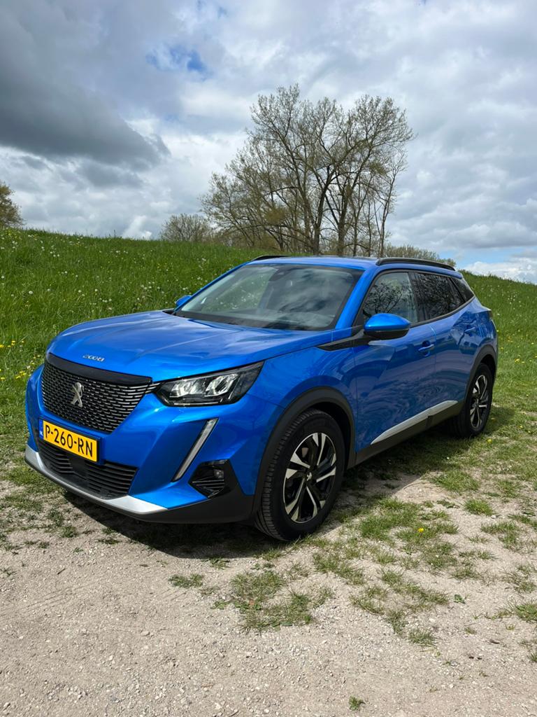 Peugeot 2008 1.2 Puretech 130pk 2021 Blauw, Auto's, Zwart, 1199 cc, Blauw, Leder en Stof