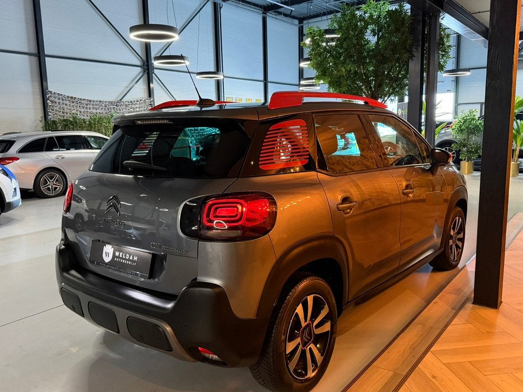 Citroen C3 Aircross 1.2 S&S Feel|Automaat|Rode accenten|360, Auto's, Stof, Gebruikt, Met garantie (alle), Parkeersensor