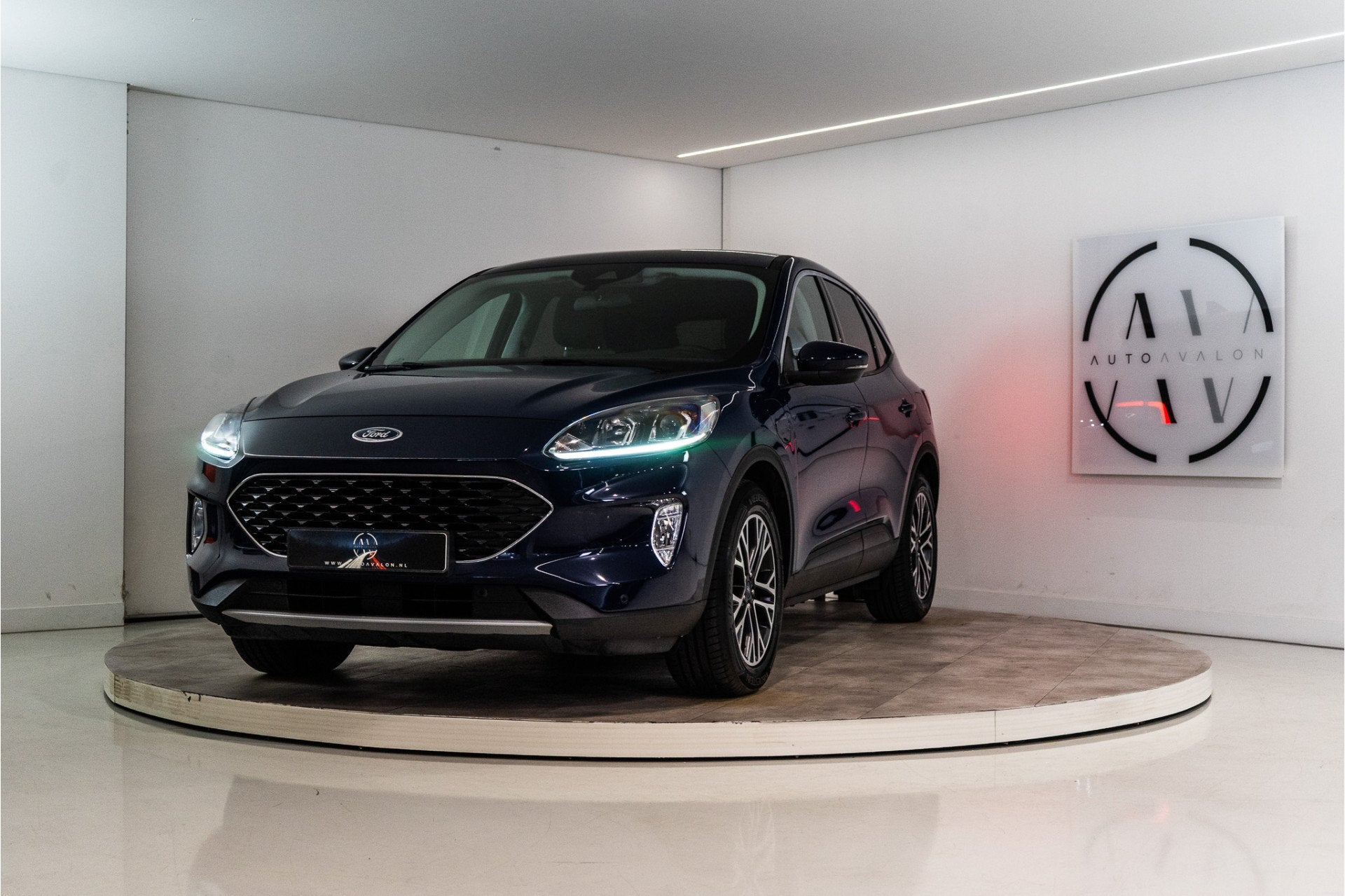 Ford Kuga 2.5 PHEV Titanium 225PK | LED | Trekhaak | Keyless, Auto's, Stof, Gebruikt, 4 cilinders, Blauw