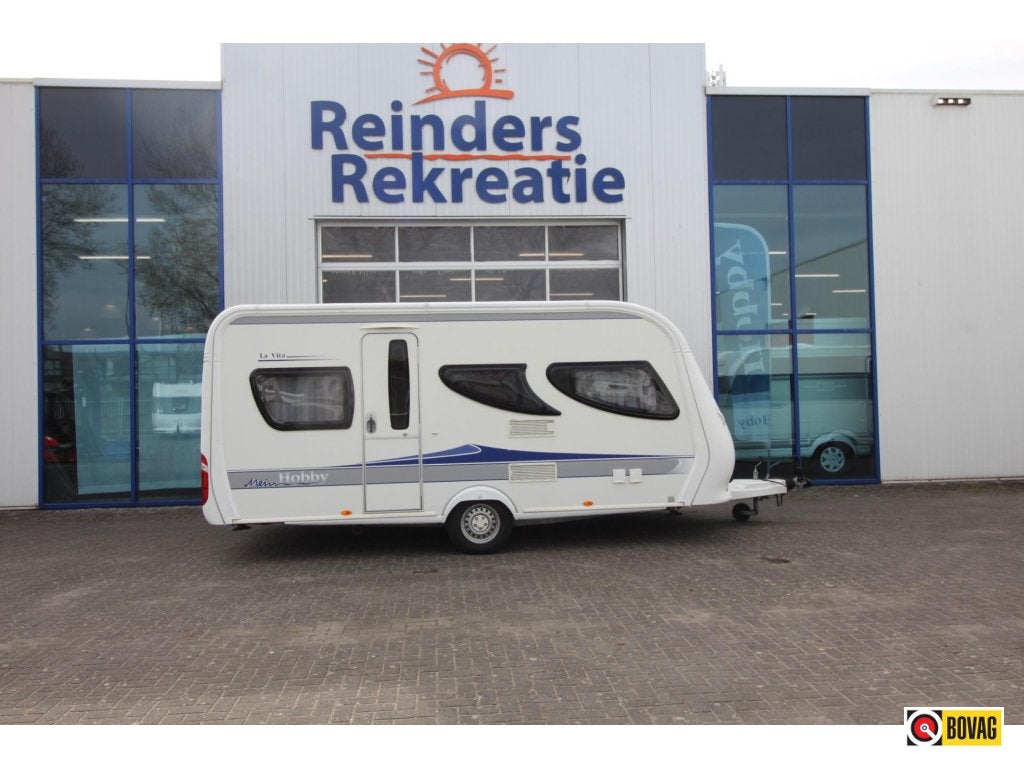 Hobby La Vita Bionda 455 UF Voortent + VT luifel., Caravans en Kamperen, Rondzit, Hobby, Dwarsbed, Bedrijf