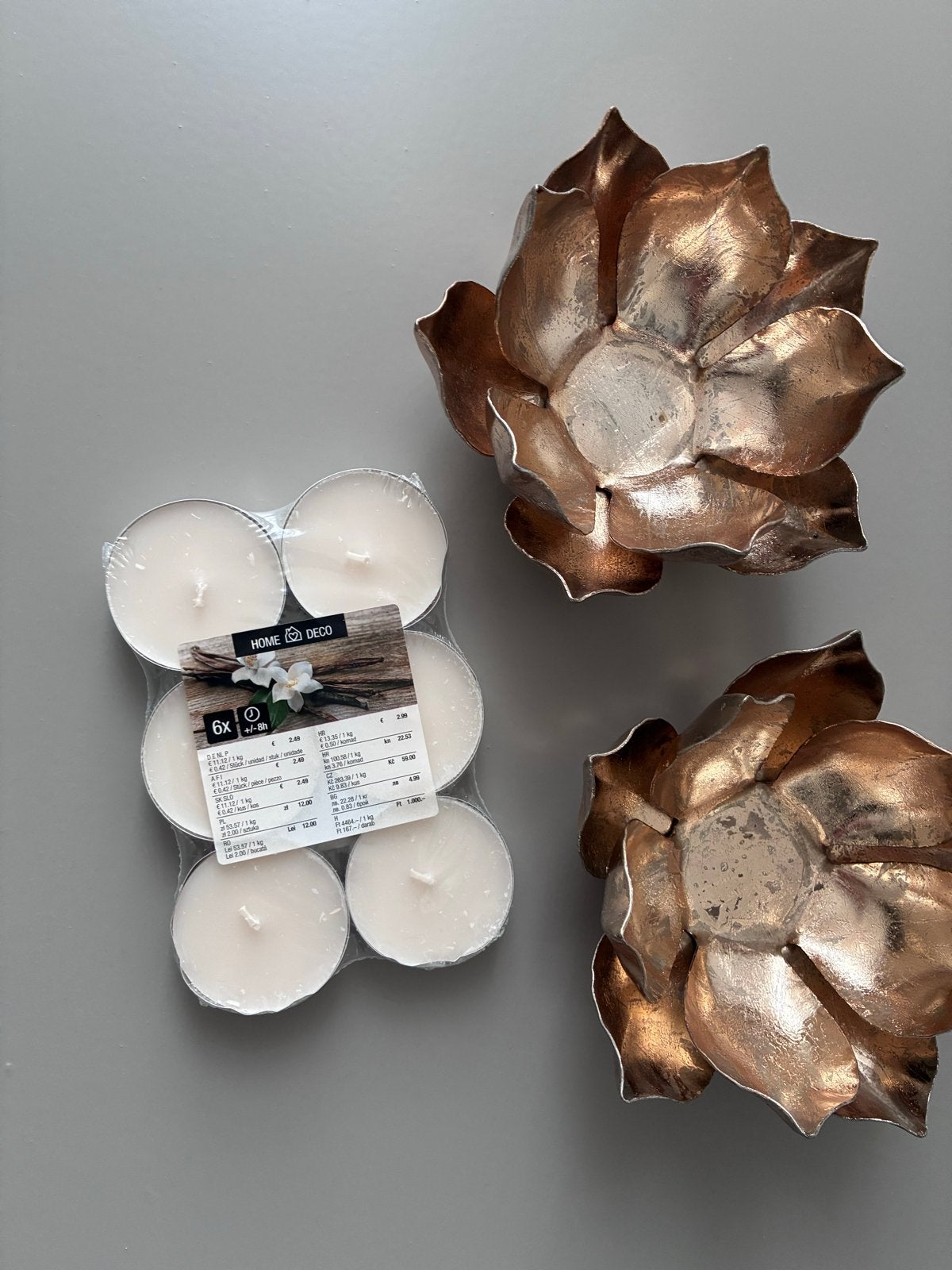 Set van 2 koperkleurige lotus waxinelichthouders, Huis en Inrichting, Ophalen of Verzenden, Zo goed als nieuw, Metaal, Waxinelichthouder