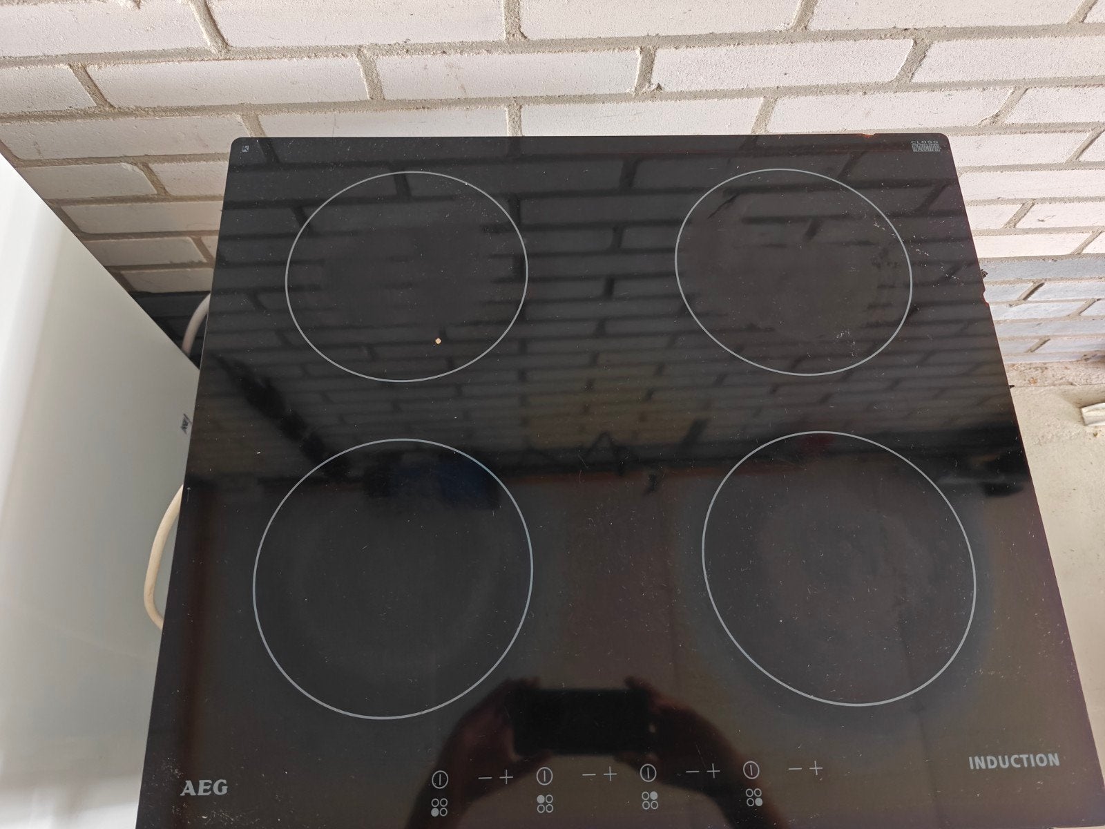 AEG Inductieplaat 4 zones, 58x51 cm, Witgoed en Apparatuur, Kookplaten, Ophalen, Gebruikt, 4 kookzones, Inbouw