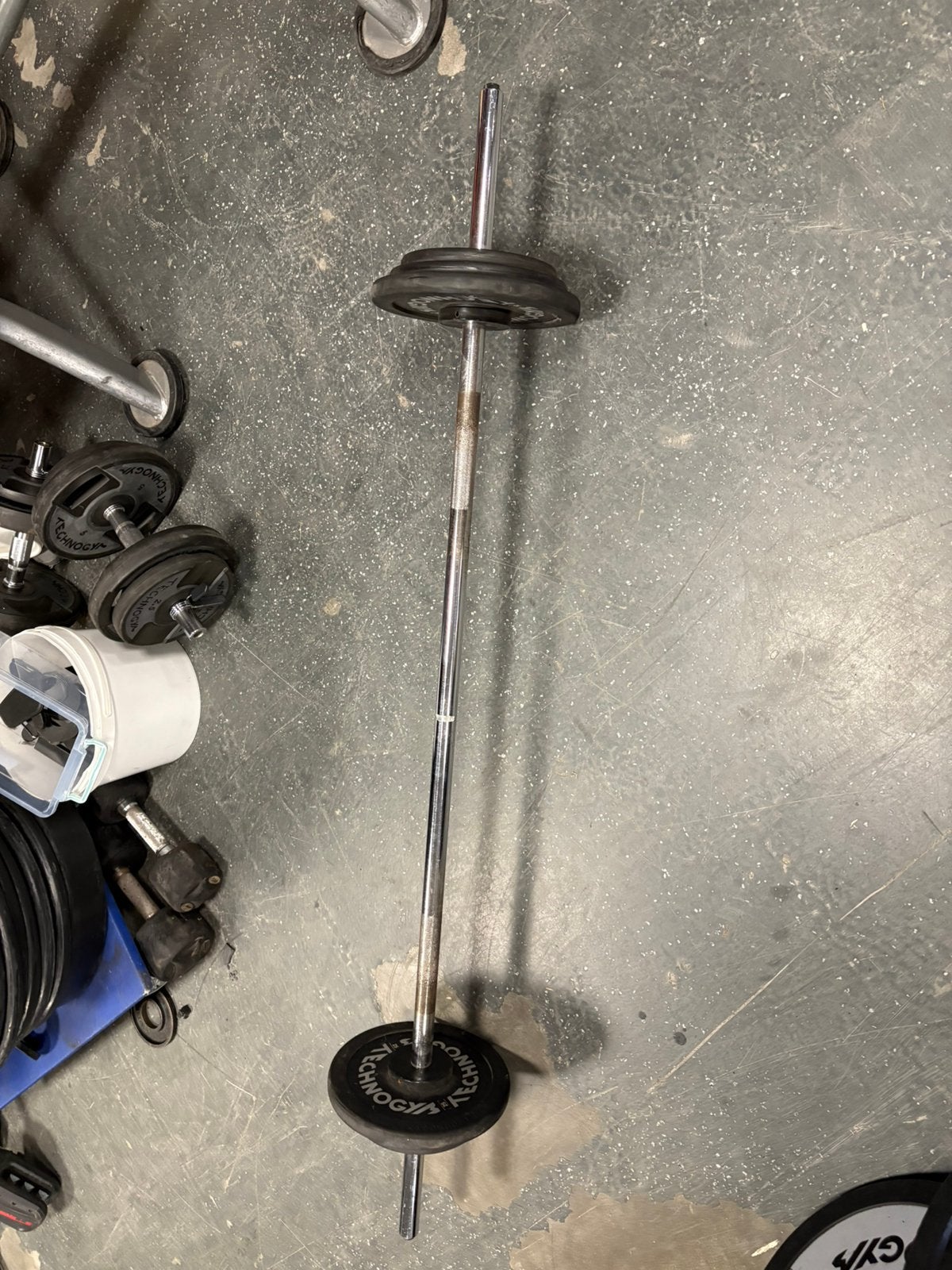 25 kg technogym vaste halter stang gewichten, Ophalen of Verzenden, 25 kg, Halter stang, Halterset