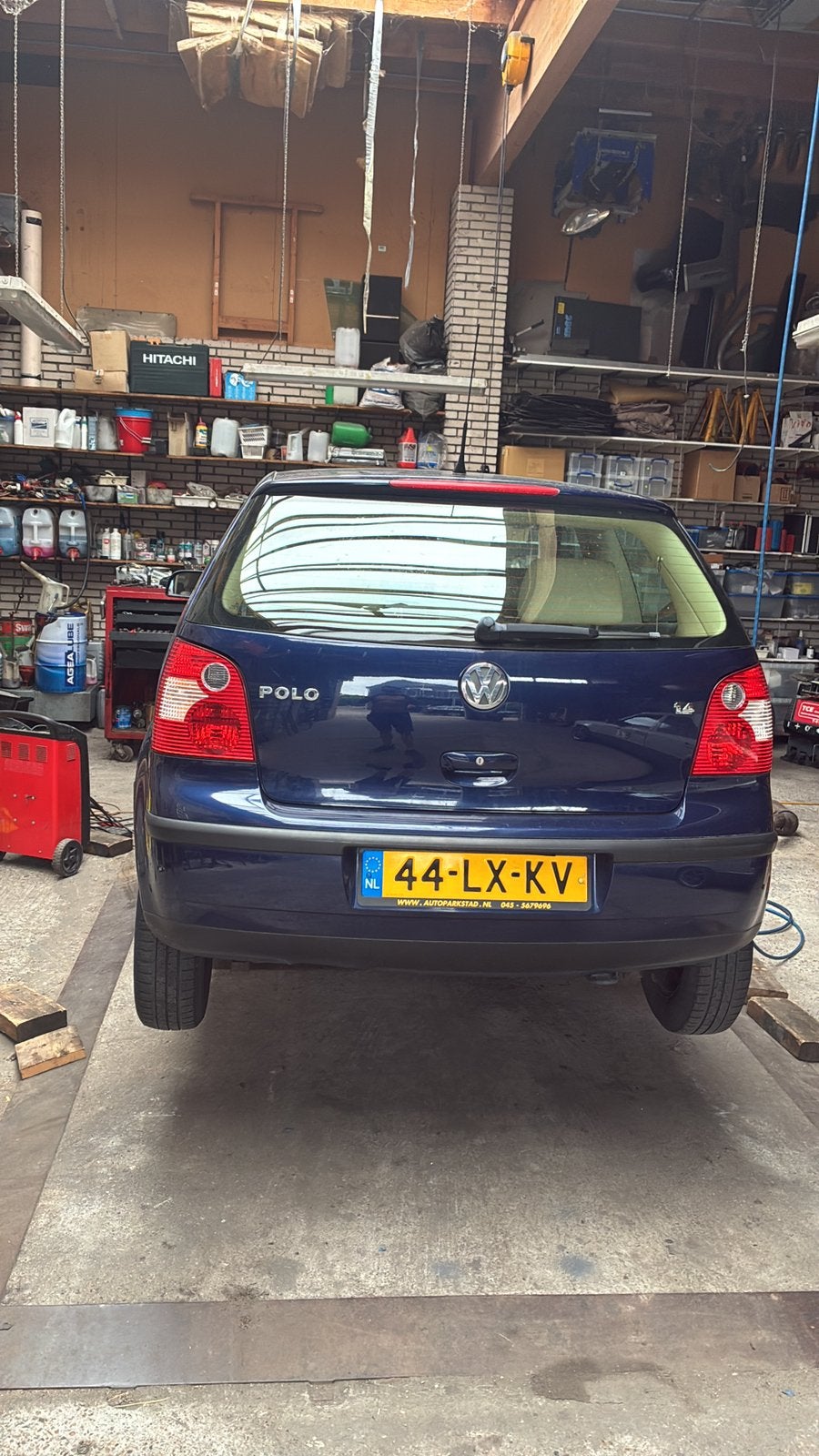 Volkswagen Polo 1.4 55KW AUT 2003 Blauw, Auto's, Stof, 74 pk, Blauw, 49 €/maand