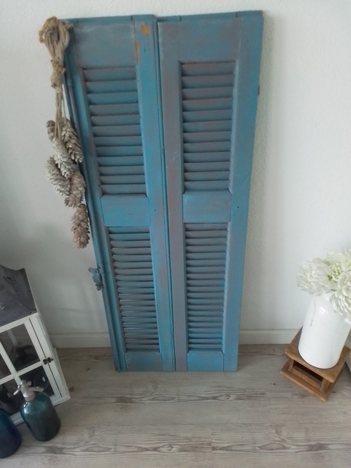 Decoratieve luiken in landelijke stijl, Ophalen