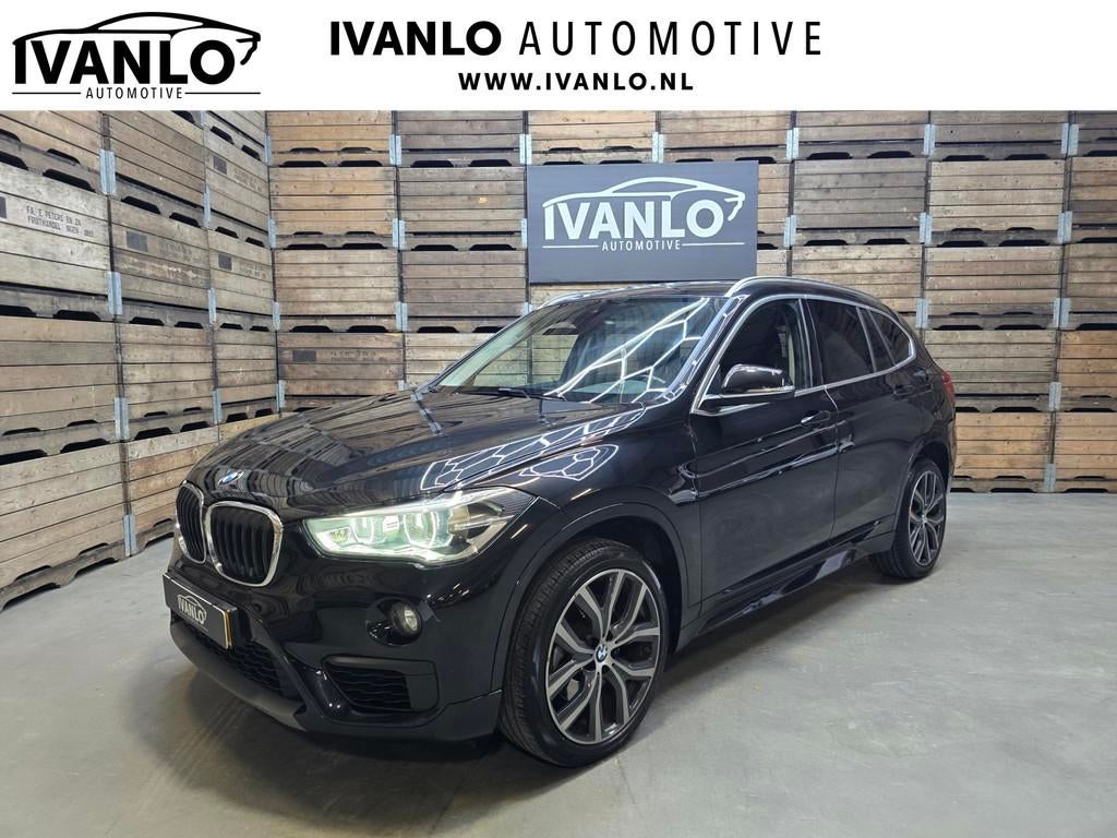 BMW X1 SDrive20i Centennial Executive Xenon Navi Airco Cruis, 1998 cc, Stof, Zwart, Origineel Nederlands