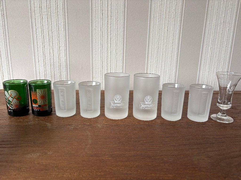 9 originele Jägermeister shotglazen, Ophalen of Verzenden, Zo goed als nieuw, Borrel- of Shotglas
