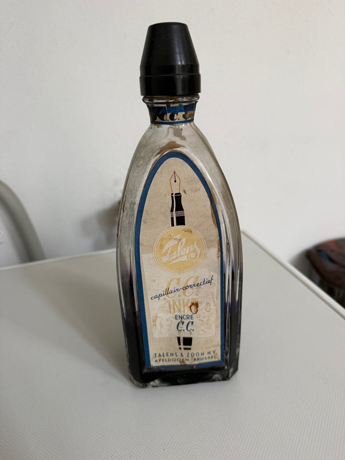 Fles Talens C.C inkt, Ophalen
