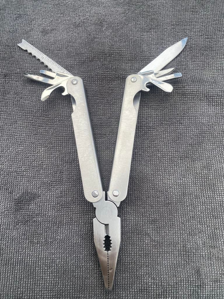 Multitool met Tang, Zaag, Mes en Flesopener, Ophalen of Verzenden, Gebruikt