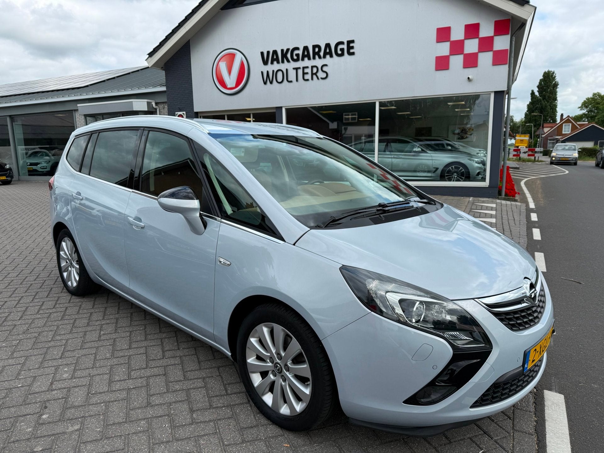 Opel Zafira Tourer 1.4 Cosmo 7p. RIJKLAARPRIJS!, Auto's, Opel, Euro 5, Stof, Gebruikt, Zwart
