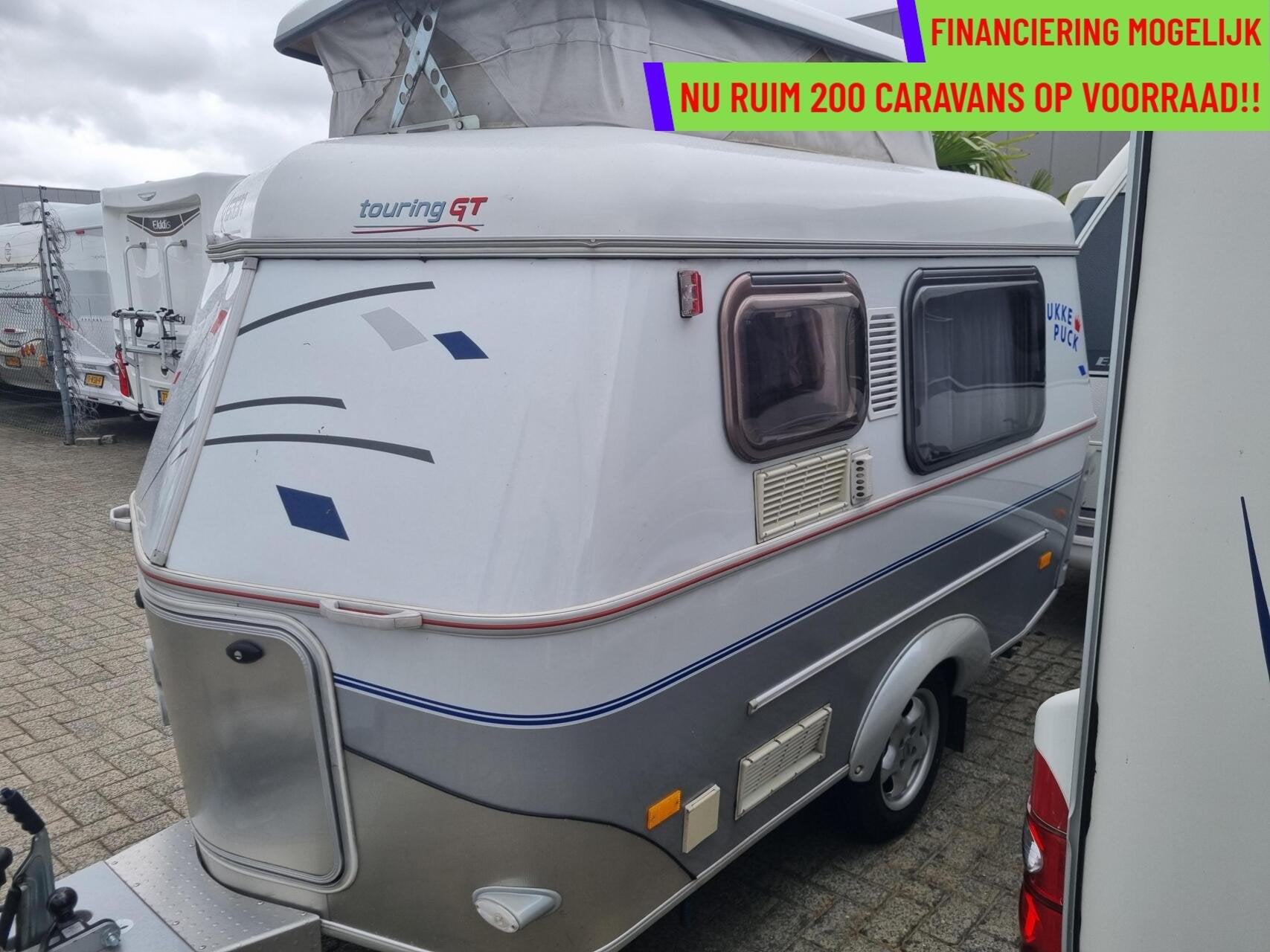 Eriba Puck Touring gt 125 VOORTENT + HEFDAK + ENKELE BEDDEN, Caravans en Kamperen, Caravans, Tot en met 2, Bedrijf, Hordeur, 4 tot 5 meter