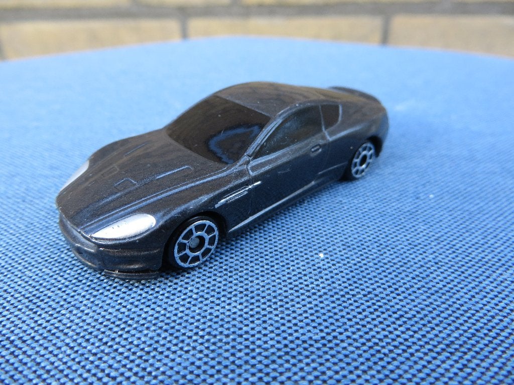 James Bond 3 inch Aston Martin DBS, Hobby en Vrije tijd, Modelauto's | Overige schalen, Ophalen of Verzenden, Zo goed als nieuw