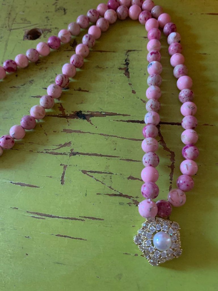 Roze kralen ketting met mooie hanger, Sieraden, Tassen en Uiterlijk, Kettingen, Overige materialen, Met strass, Ophalen of Verzenden