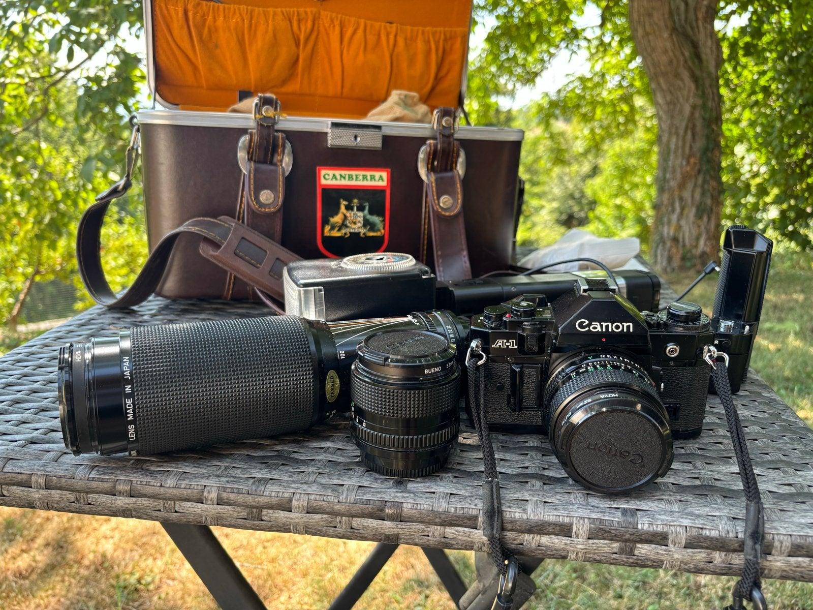 Canon A-1 Spiegelreflexcamera met 2 lenzen en accessoires, Audio, Tv en Foto, Fotocamera's Analoog, Ophalen of Verzenden, Gebruikt