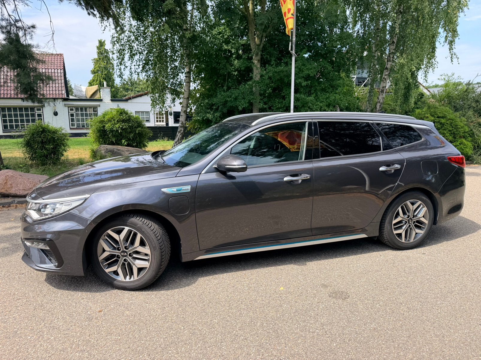 Kia Optima Sportswagon 2.0 GDi Phev AT6 205 PK VOL OPTIES, Auto's, Zwart, Hybride Elektrisch/Benzine, 102 €/maand, Optima Sportswagon