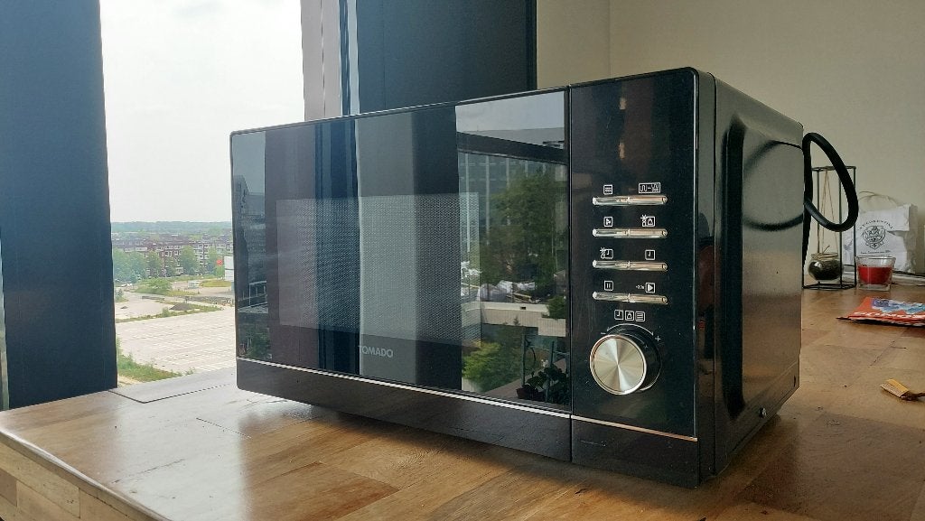 Tomado combi zeer goede staat. TMC2302B/10, Witgoed en Apparatuur, Magnetrons, Ophalen, Combimagnetron, Zo goed als nieuw, Draaiplateau