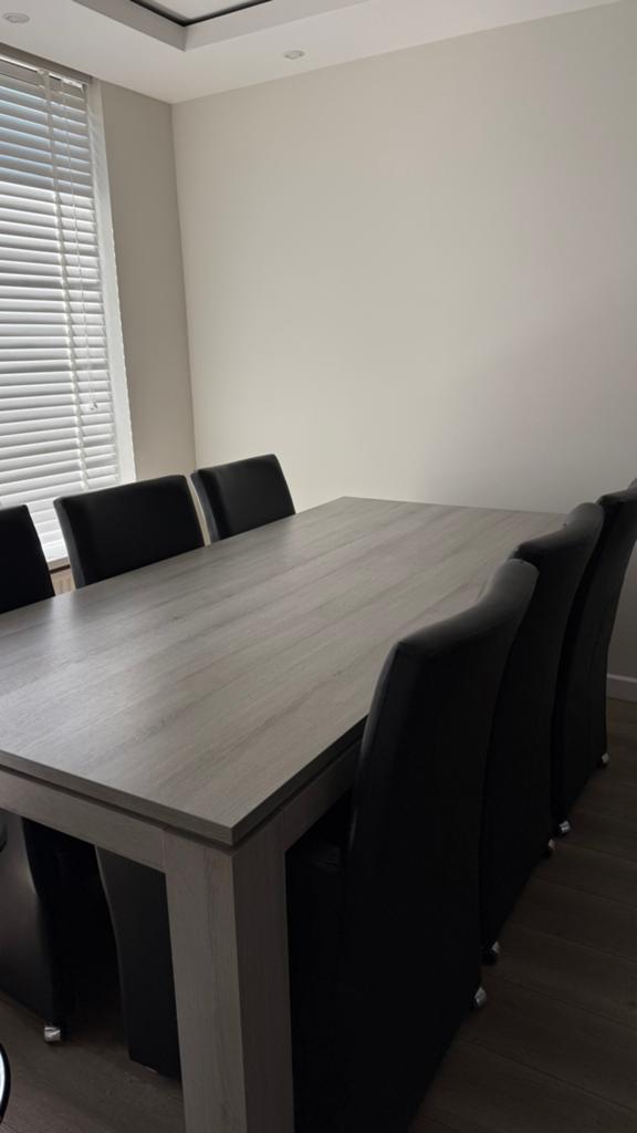 Eettafel met stoelen, Ophalen
