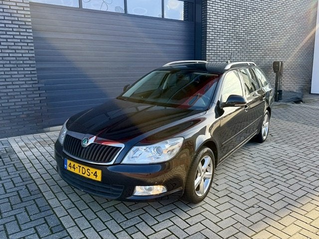 Skoda Octavia Combi 1.2 TSI Elegance Automaat Nieuwe DSG kop, Auto's, Automaat, Euro 5, Gebruikt, 4 cilinders