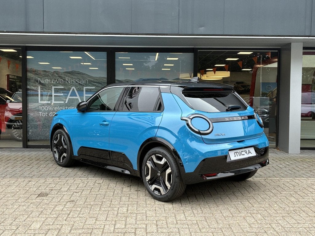 Nissan Micra EVOLVE 52 kWh NIEUW UIT VOORRAAD LEVERBAAR | Pa, Auto's, Nissan, Huisgarantie, Blauw, Leder en Stof, 416 km