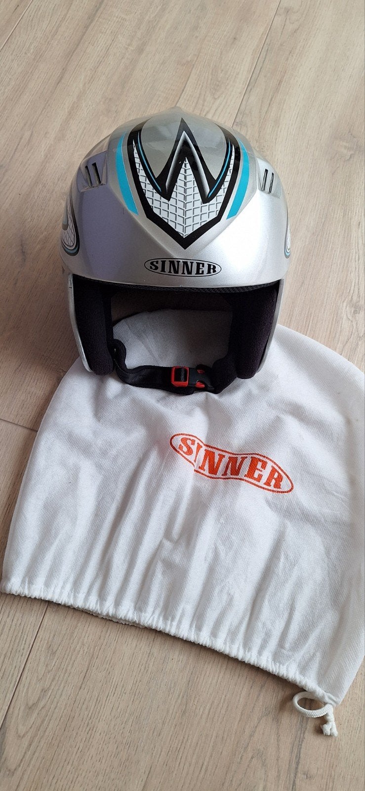 Sinner skihelm 57/58, Ophalen