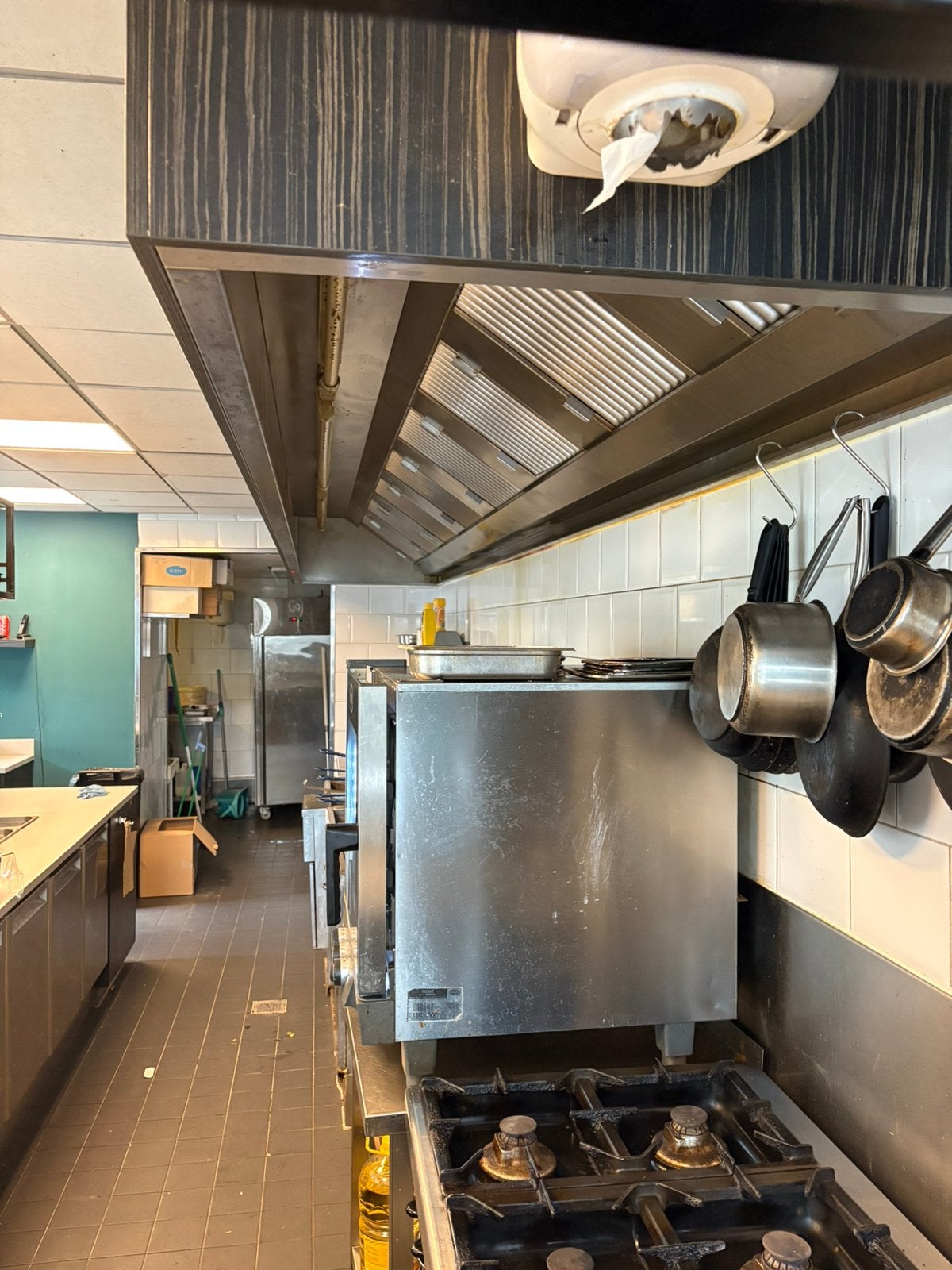 Afzuigkap horeca, Ophalen, Wandschouwkap