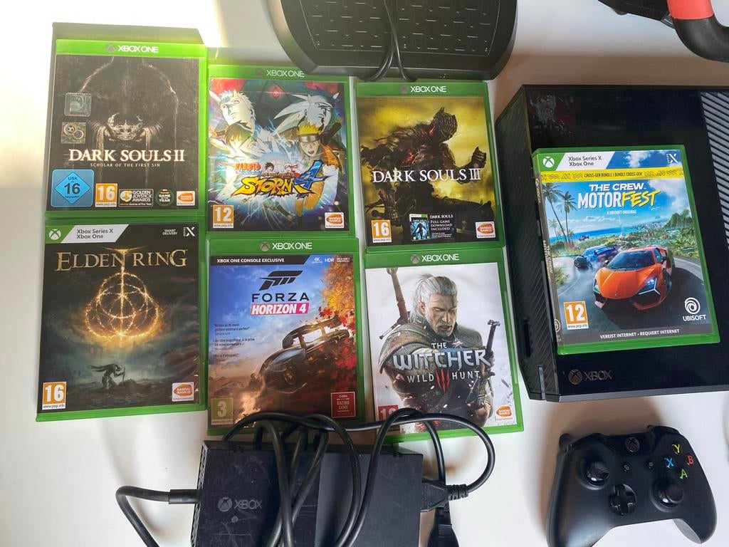 Xbox One met 7 games, controller en racestuur, Spelcomputers en Games, Games | Xbox One, Gebruikt, Overige genres, 1 speler, Vanaf 16 jaar