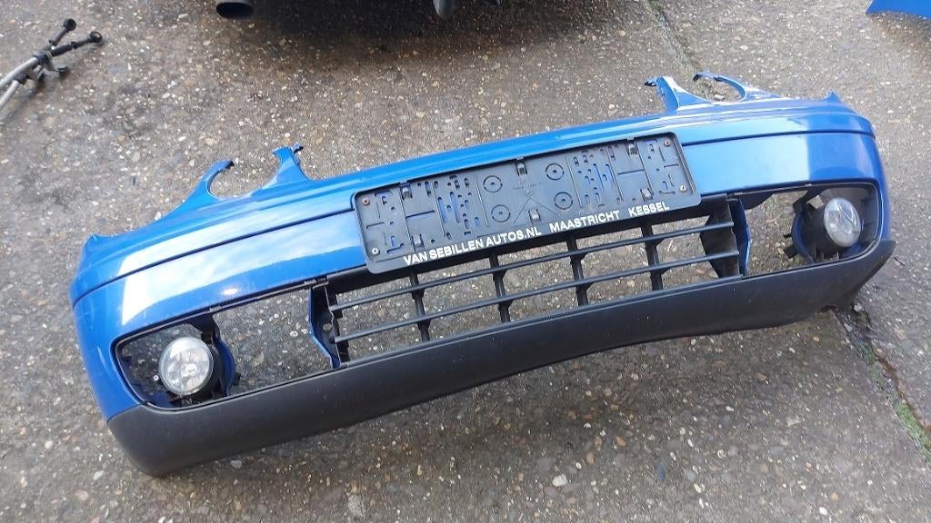 Blauwe voorbumper VW Polo 2004, Ophalen of Verzenden