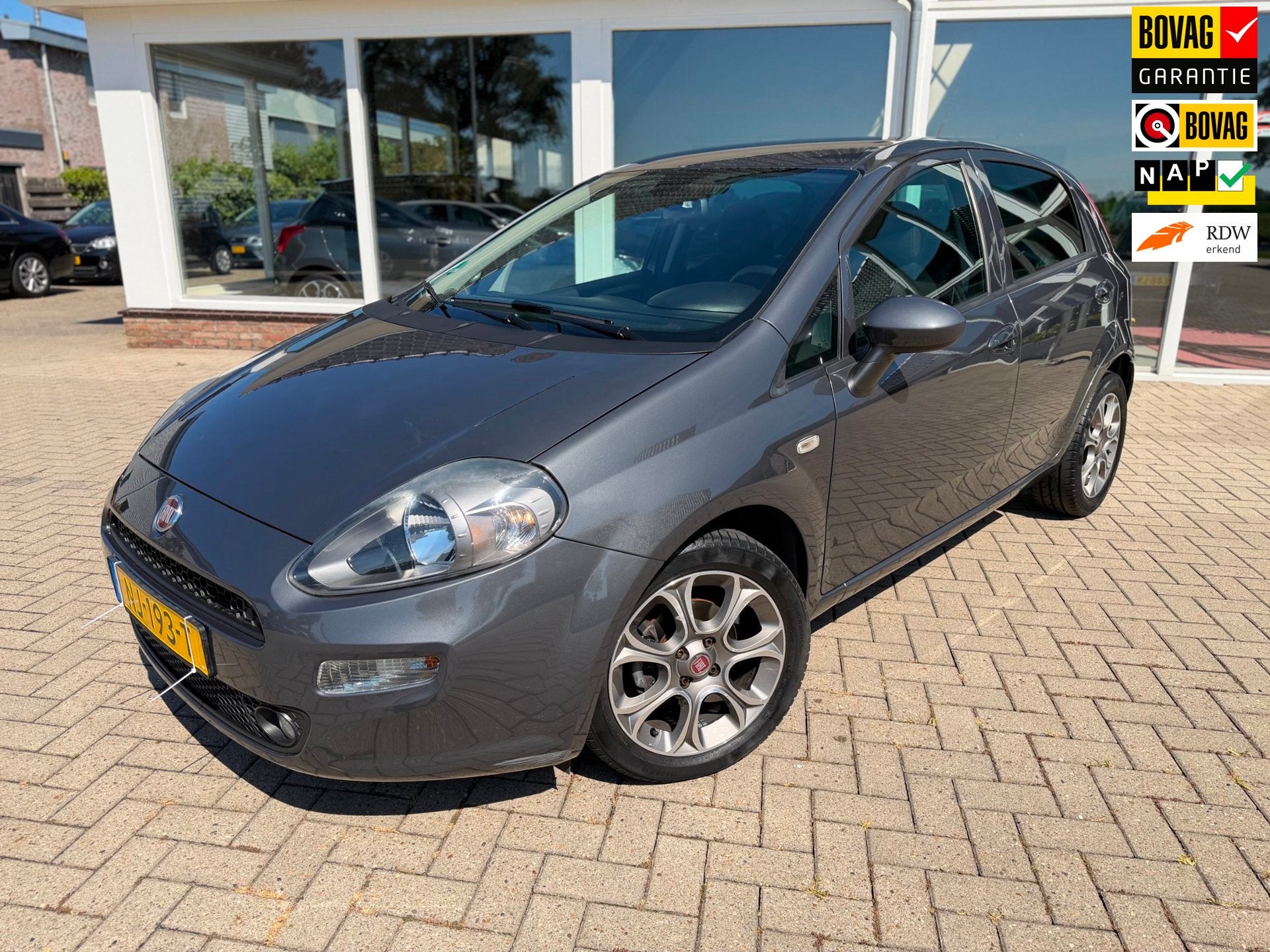 Fiat Punto Evo 0.9 TwinAir Lounge/ Airco/ Navi/ Cruise/ LM V, Auto's, Fiat, Voorwielaandrijving, Dealer onderhouden, Gebruikt