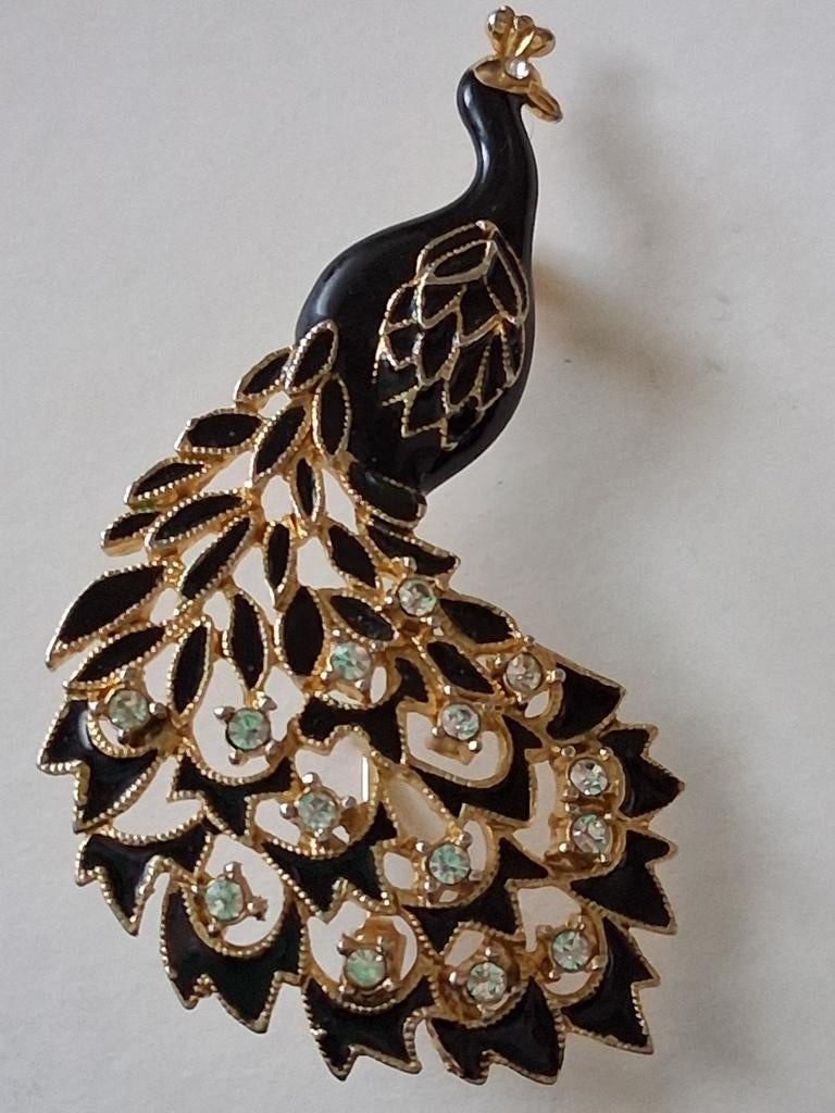 Pauwenbroche zwart met goud en steentjes, Verzenden, Goud, Overige materialen