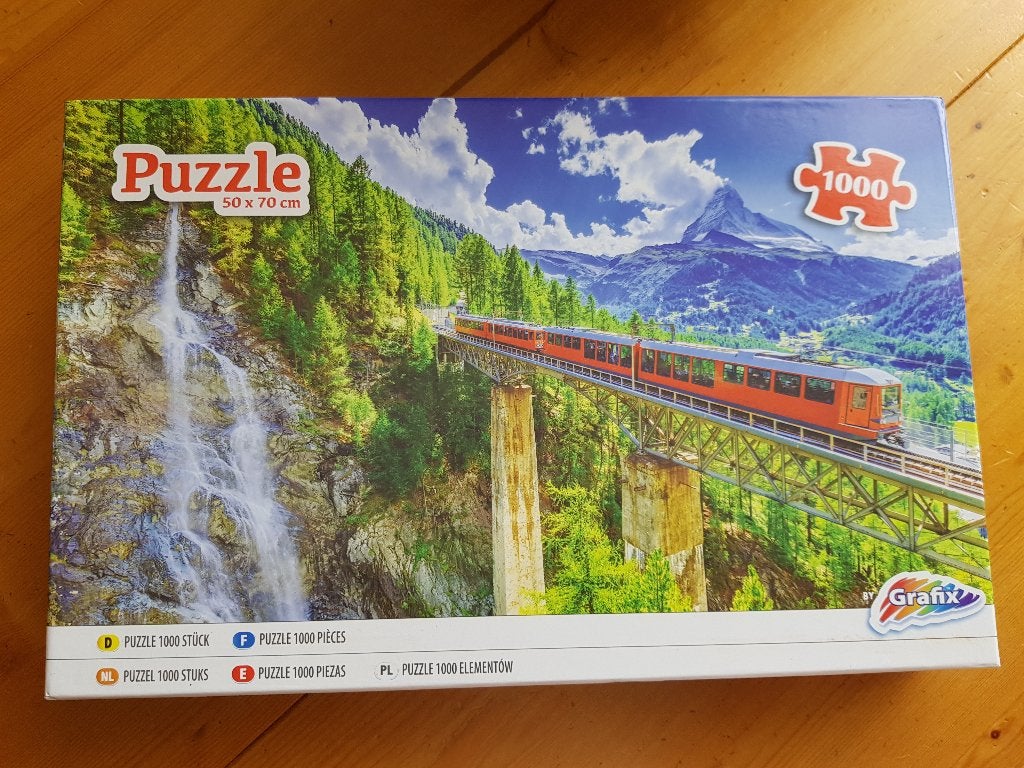Puzzel van trein en berglandschap 1000 stukjes, Hobby en Vrije tijd, Ophalen, 500 t/m 1500 stukjes, Zo goed als nieuw, Legpuzzel