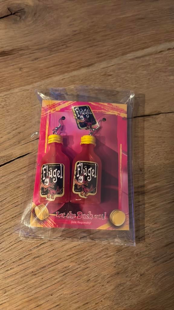 Flugel oorbellen, Hobby en Vrije tijd, Feestartikelen, Verzenden, Zo goed als nieuw