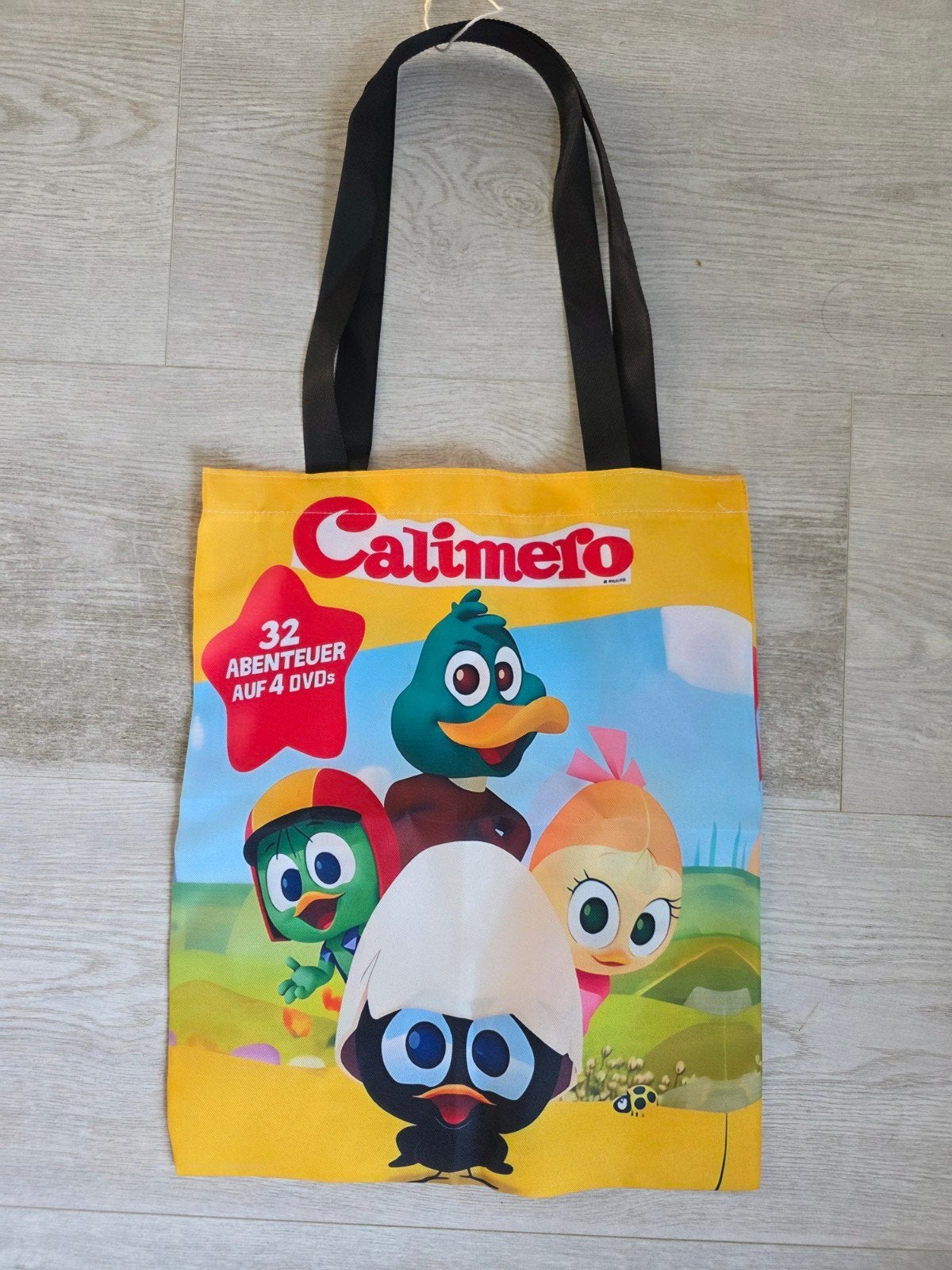Nieuw CALIMERO  tasje
opvouwbaar
leuk voor kleine boodschapj, Verzamelen, Ophalen of Verzenden, Nieuw, Tv, Gebruiksvoorwerp