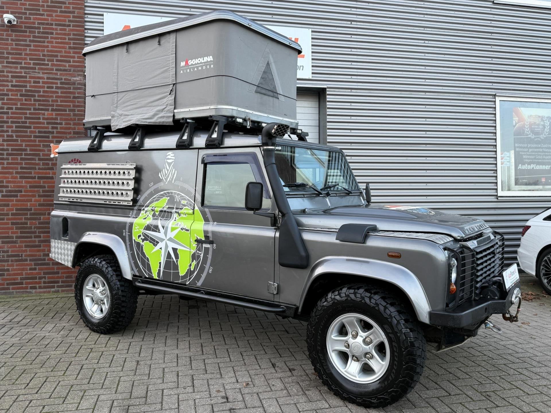 Land Rover Defender 2.4 Td4 110 E! Airco! Leder! Mini-Camper, Auto's, Gebruikt, Zwart, 4 cilinders, 122 pk