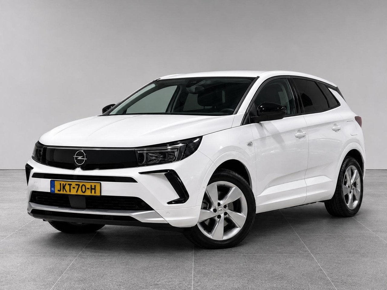 Opel Grandland Elegance 1.6 PHEV 225pk Hybrid e-EAT8 | AGR-S, Auto's, Dealer onderhouden, Gebruikt, 4 cilinders, Bedrijf