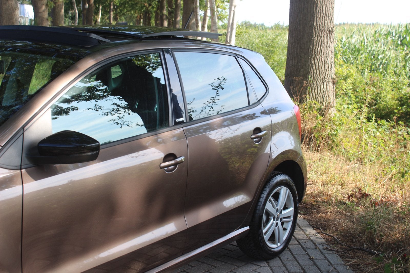 Volkswagen Polo 1.2 2011 Bruin Pano/Velgen/stoelverw/navi, Voorwielaandrijving, Zwart, 1198 cc, Bedrijf
