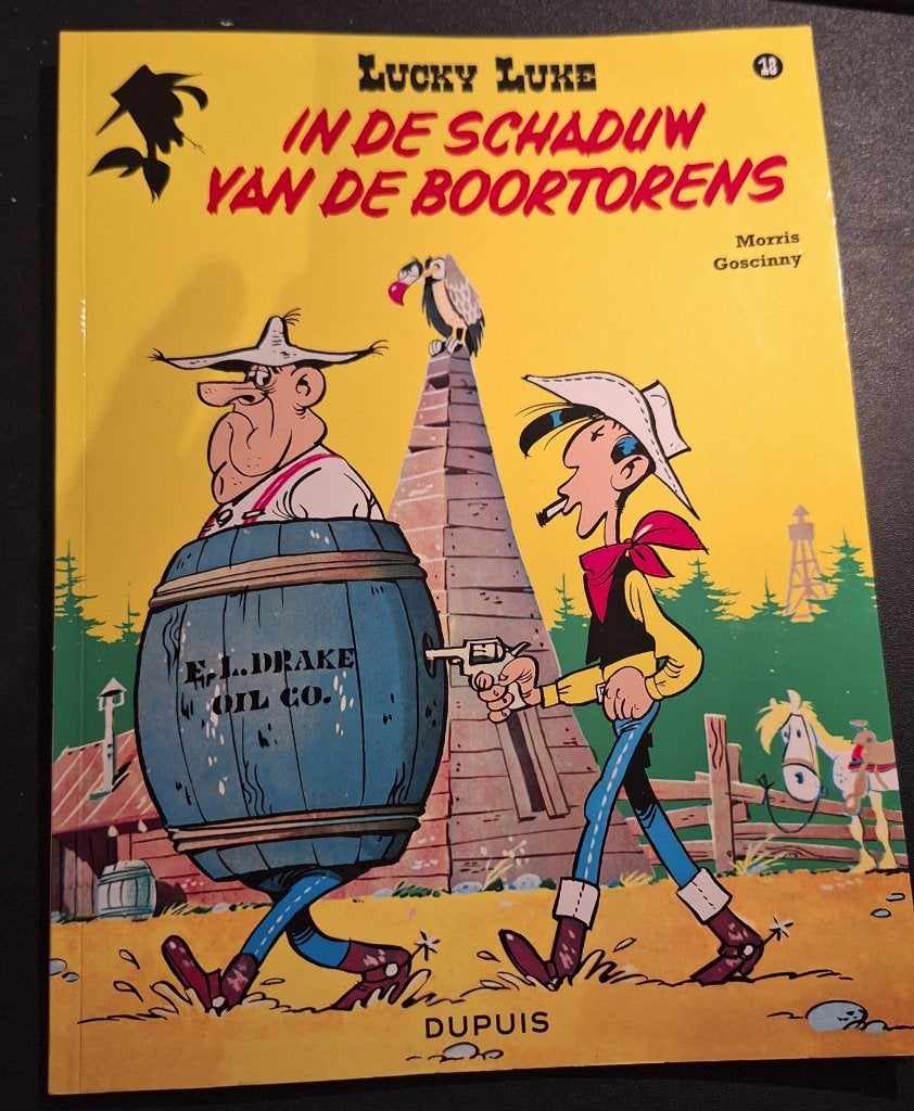 lucky Luke in de schaduw van de boortorens 2018, Eén stripboek, Ophalen of Verzenden, Zo goed als nieuw