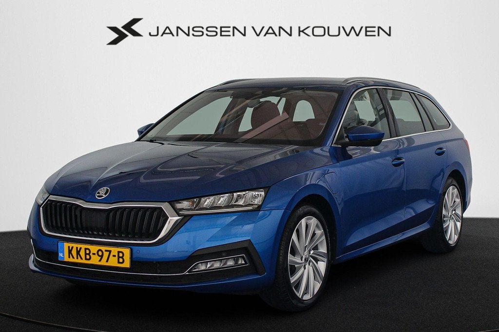 Skoda Octavia Combi 1.4 TSI iV PHEV Business Edition Plus He, Stof, Plug-in hybride, 13 kWh, Geïmporteerd