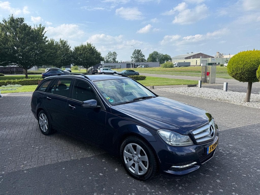 Mercedes-Benz C-klasse Estate 180 Ambition 2013, Auto's, Mercedes-Benz, Achterwielaandrijving, Blauw, Leder en Stof, Handgeschakeld