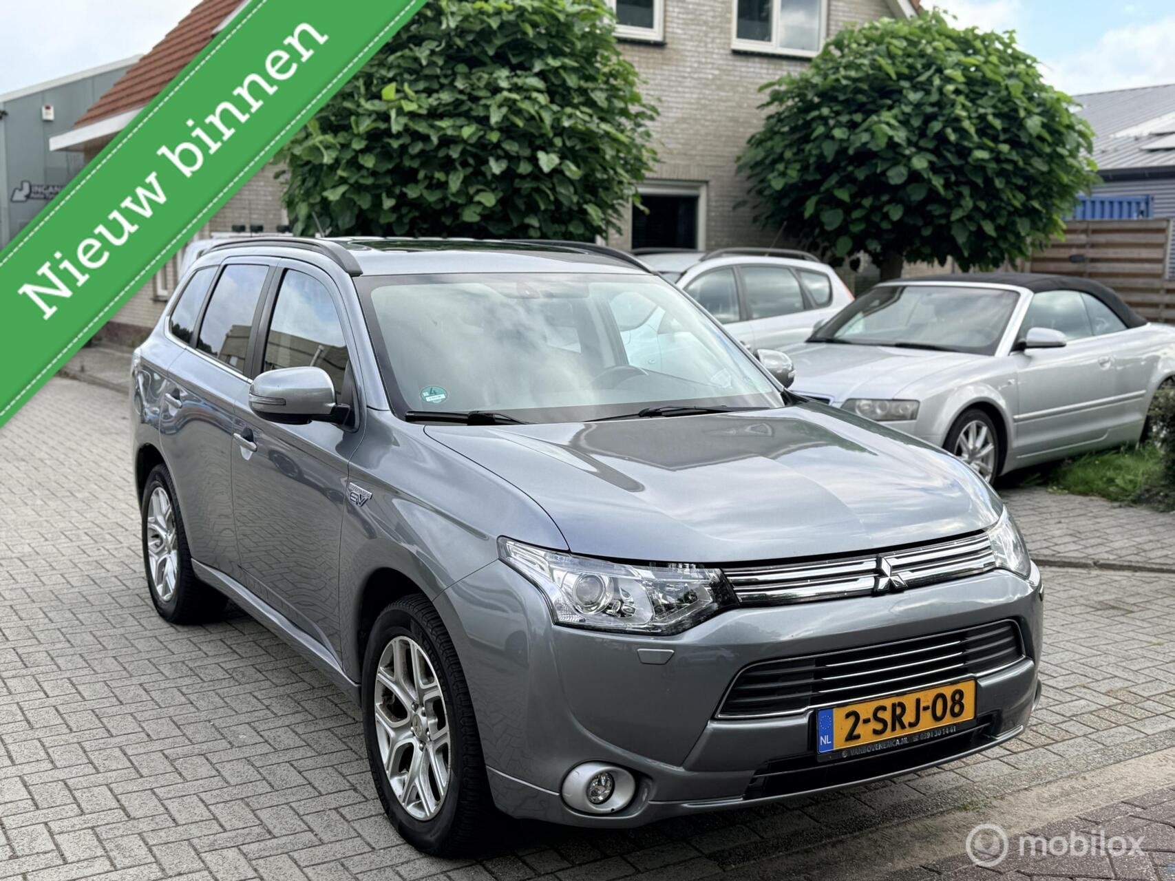 Mitsubishi Outlander 2.0 PHEV Instyle, Auto's, Mitsubishi, 4 cilinders, Bedrijf, Vierwielaandrijving, Hybride Elektrisch/Benzine