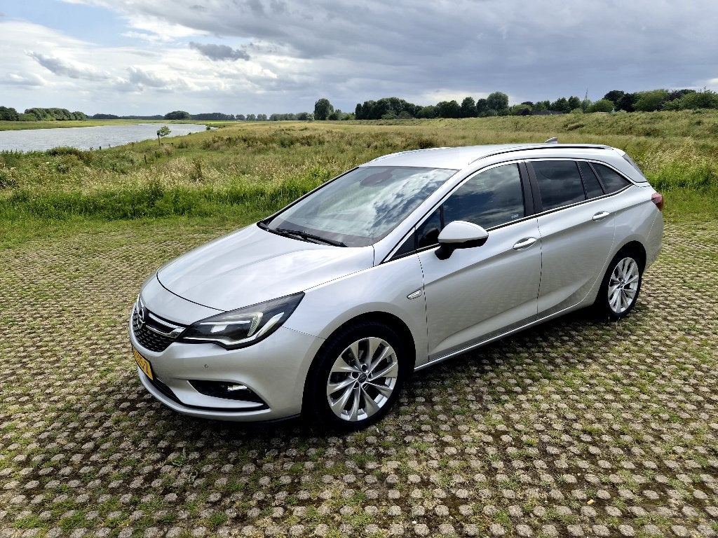 Opel Astra 1.0 Turbo 77KW Sports Tourer 2016 Zilver Grijs, Auto's, Voorwielaandrijving, Stof, Lane Keeping Assist, Euro 6