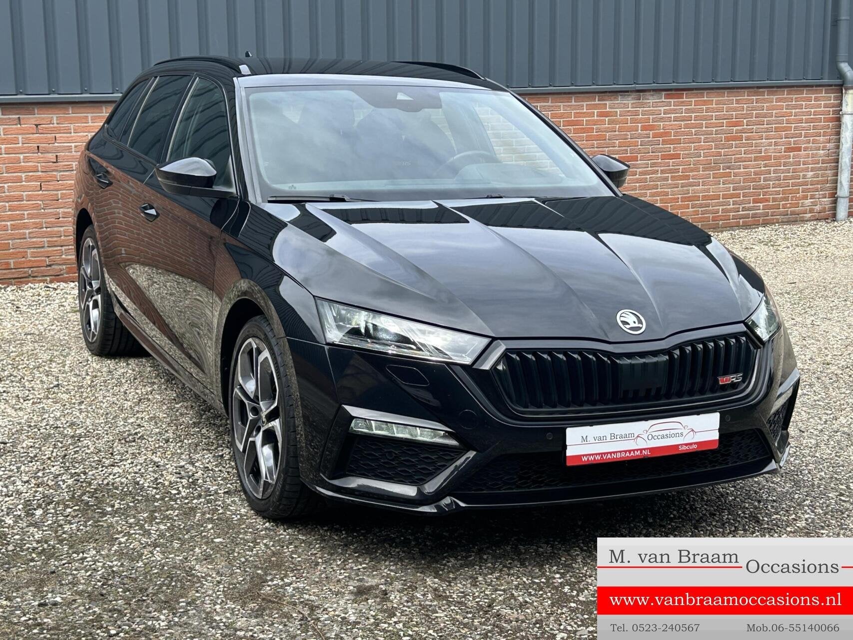 Skoda Octavia Combi 1.4 TSI RS iV PHEV Sportline Business, Auto's, Gebruikt, Euro 6, 4 cilinders, Zwart