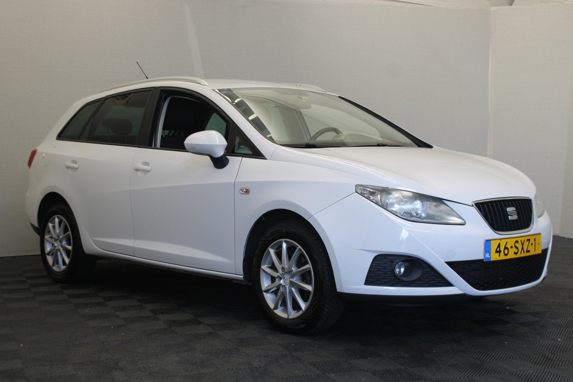SEAT Ibiza ST 1.2 TSI Style (bj 2012), Auto's, Voorwielaandrijving, Euro 5, Stof, Zwart