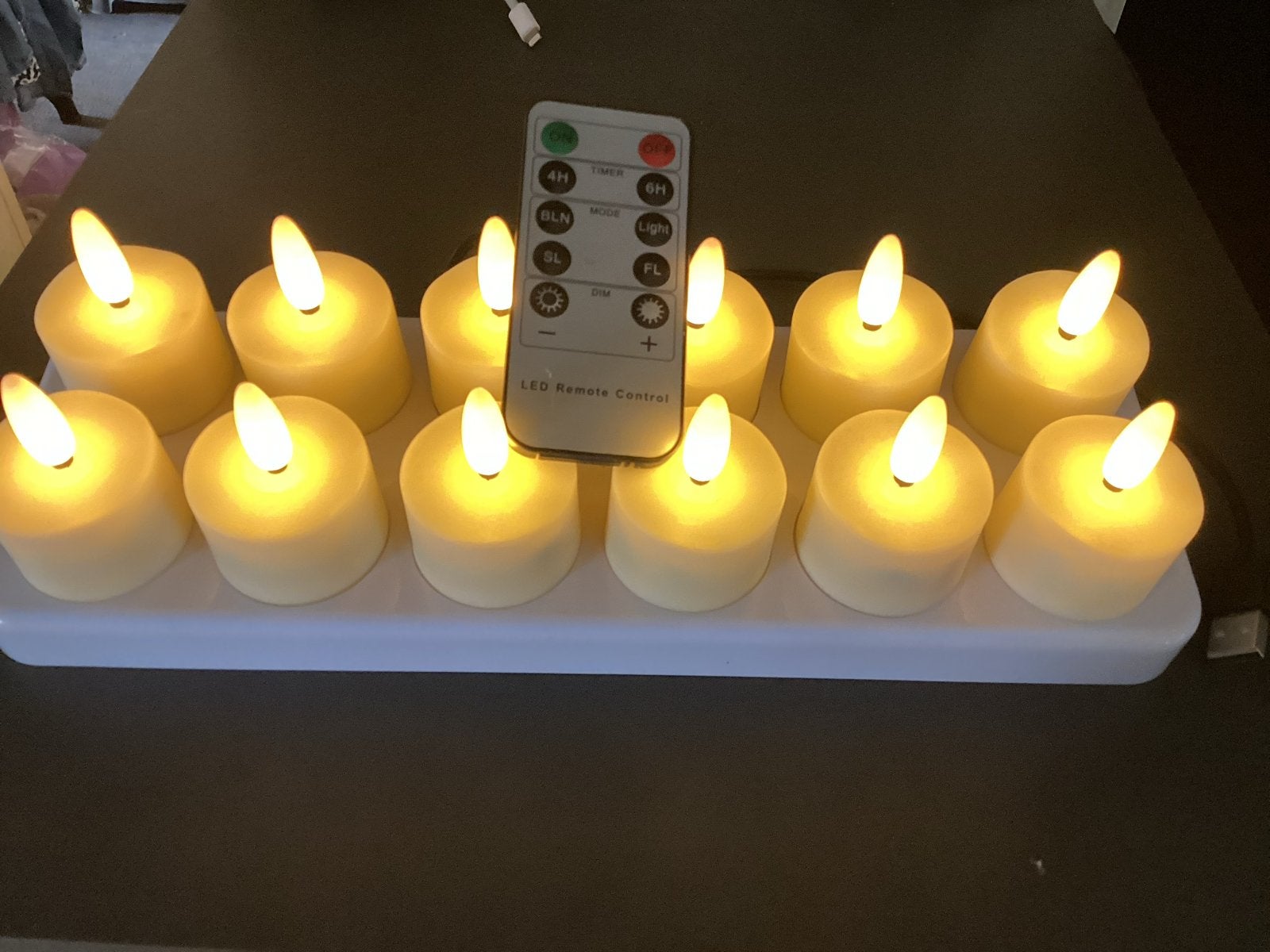Waxinelichtjes LED 12x oplaadbaar met Afstandsbediening, Kunststof, Wit, Ophalen of Verzenden, Zo goed als nieuw