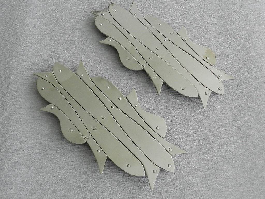 Set van 2 Alessi "Pescher" Onderzetters., Ophalen of Verzenden, Overige typen, Metaal, Verstelbaar