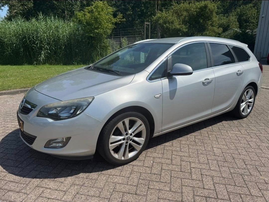 Opel Astra 1.4 Turbo 103KW Sp.tourer AUT 2011 Grijs, Auto's, Opel, 15 km/l, 4 cilinders, Origineel Nederlands, 1364 cc