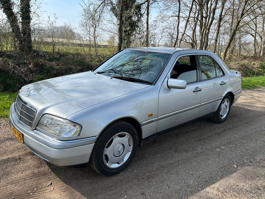 Mercedes-Benz C-Klasse  C180 Benzine 1994 Grijs, Zwart, 1799 cc, 122 pk, Handgeschakeld