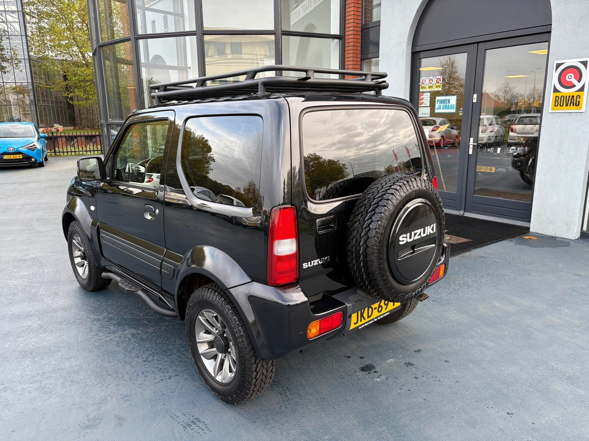 Suzuki JIMNY 1.3 Rhino 4X4 LEDER LMV AIRCO, Auto's, Suzuki, Gebruikt, Euro 6, 4 stoelen, Zwart