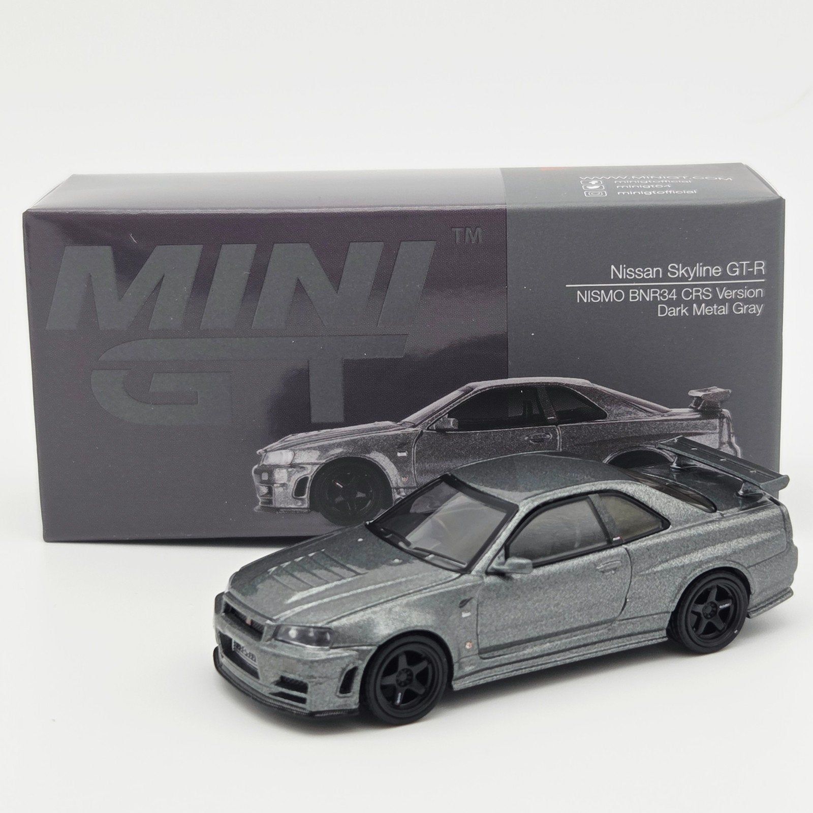 Mini Gt – 1999 Nissan Skyline GTR (R34), dark metal gray nis