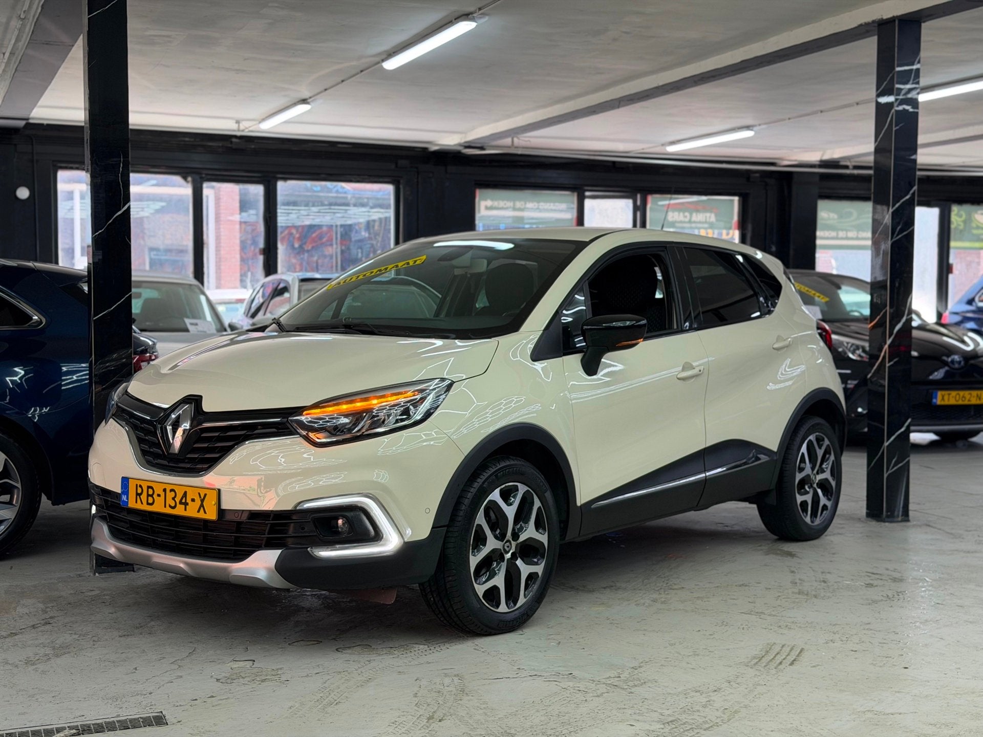 Renault Captur 1.2 TCe Intens Automaat | Camera | Navigatie, Auto's, Renault, Gebruikt, 4 cilinders, Bruin, 635 kg