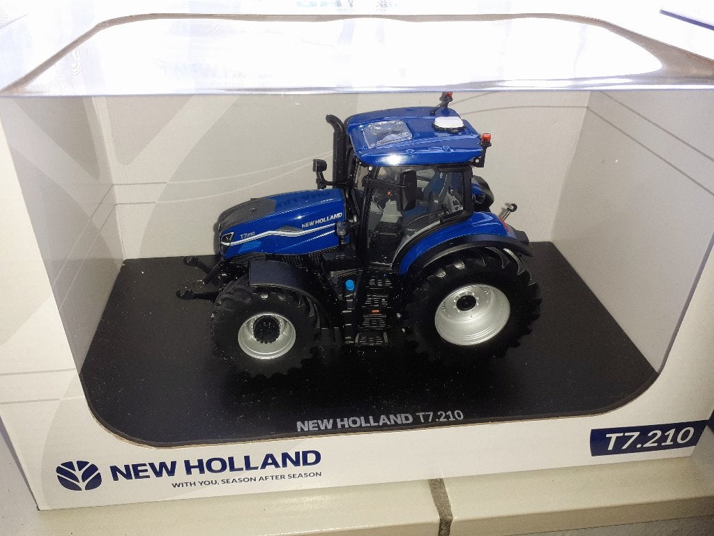 New Holland T7.210 - UH     (britains - siku), Ophalen of Verzenden, Nieuw, Tractor of Landbouw, Britains
